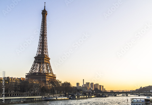 Eiffel Tower view from river at sunset