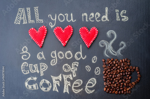 Foto all you need is love and a good cup of coffee with coffee beans
