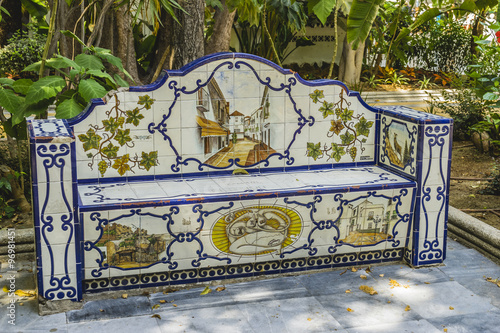 seville, bank beautiful painted tile pieces in Marbella, Andaluc photo