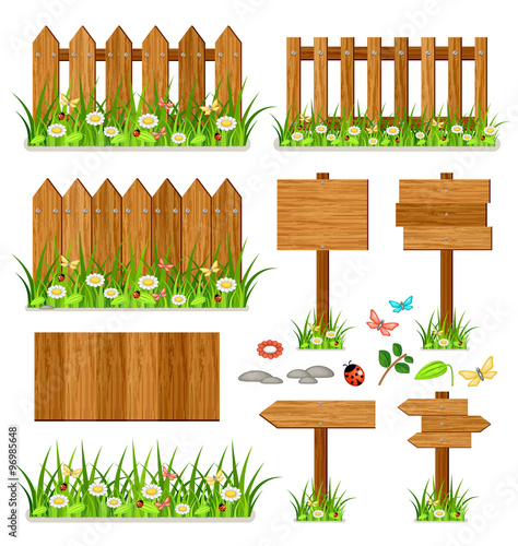 Wooden fence set with grass and flowers