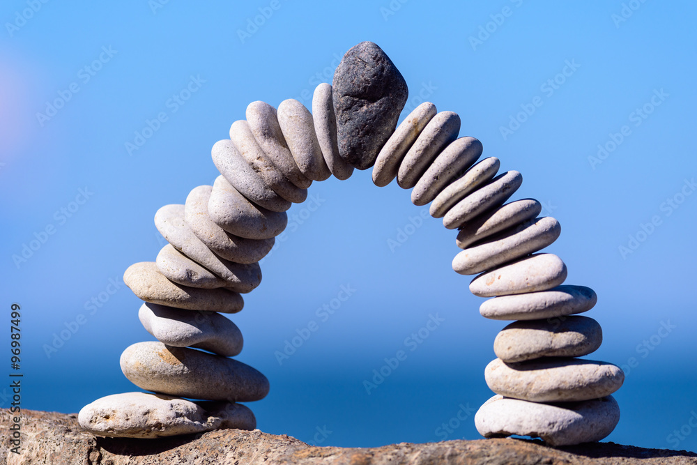 Arch of white pebbles