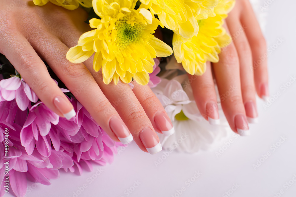 Well-groomed female hands with manicure.