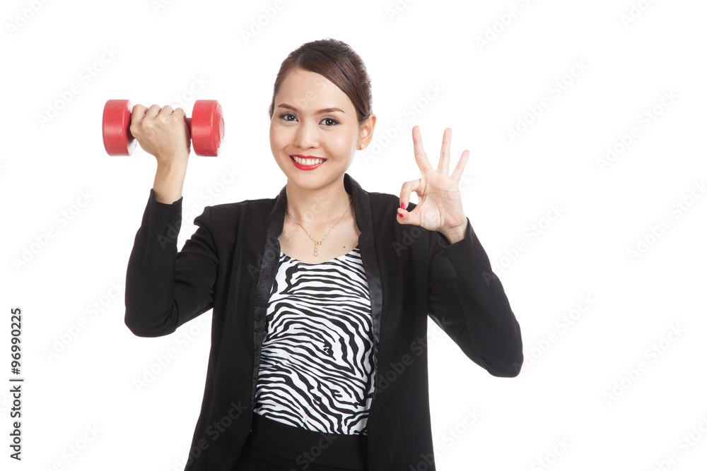 Healthy Asian business woman show OK with dumbbells Healthy Asian business woman show OK with dumbbells