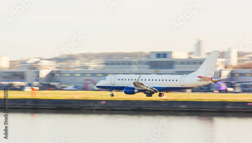 Panning view of an airplane taking off or landing