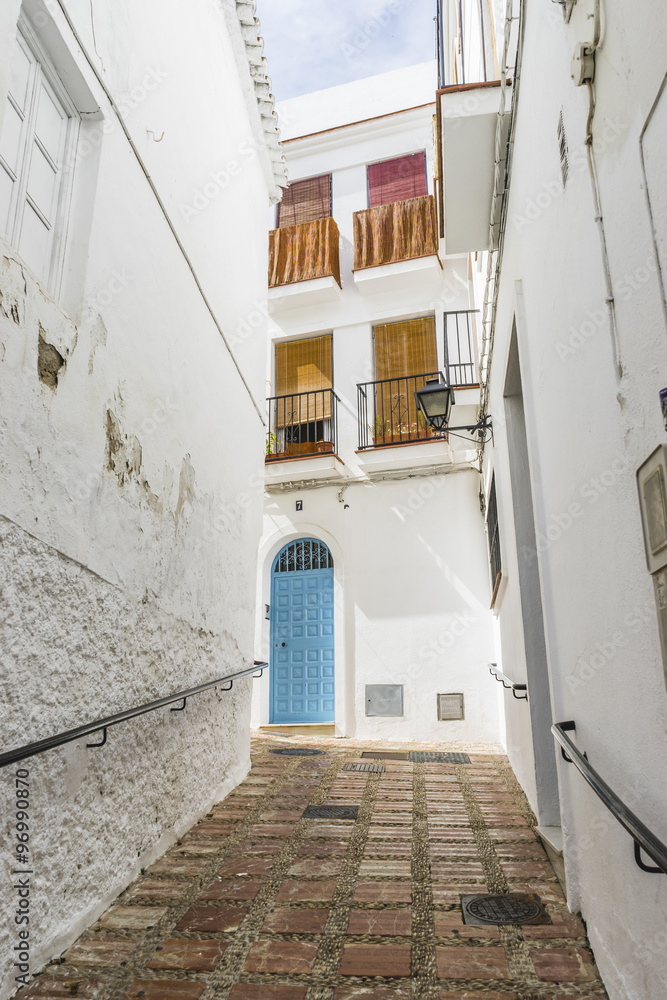 spanish, architecture and streets of white flowers in Marbella A