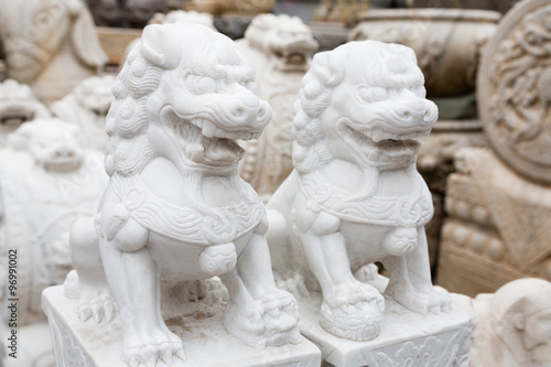 Chinese mythological sculpture in stone at a flea market