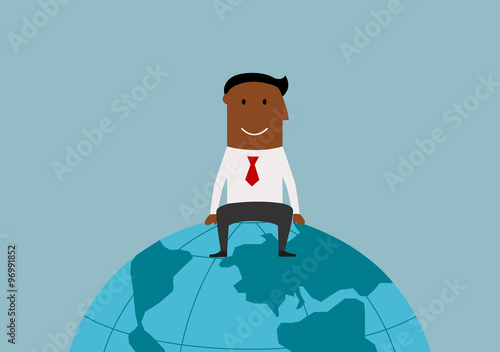 Happy businessman sitting on the earth globe