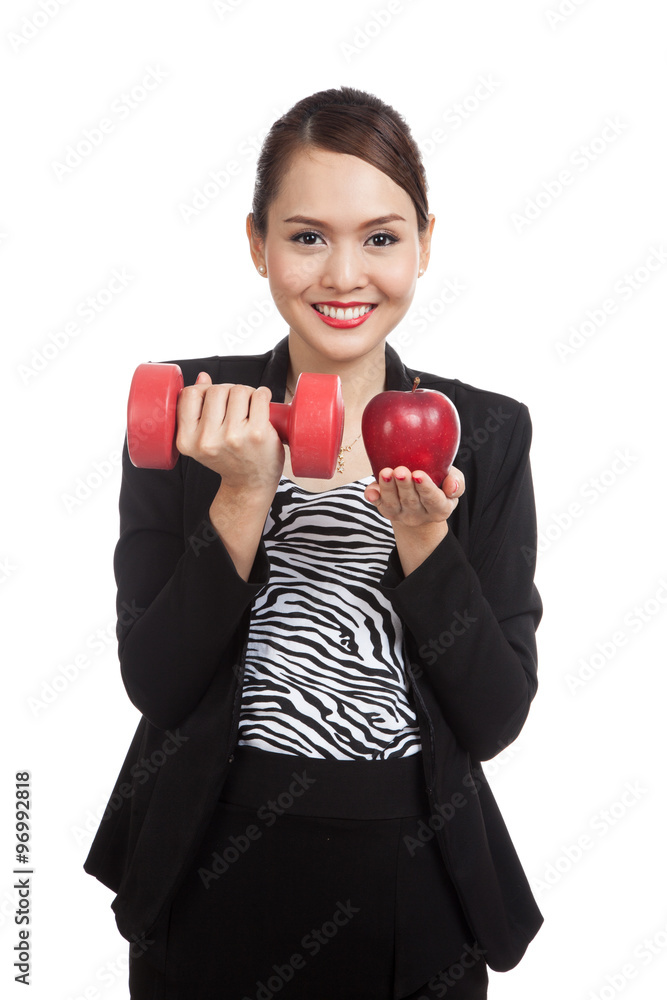 Young Asian business woman with red apple and dumbbells Young Asian business woman with red apple and dumbbells