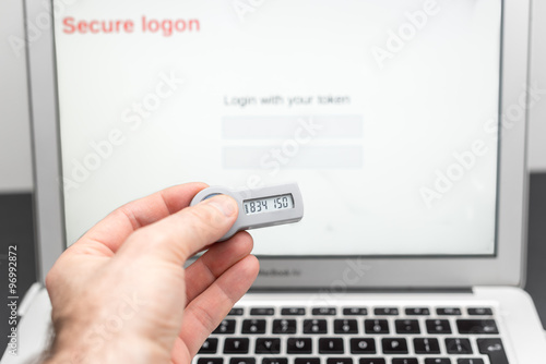 Secure token in front of a laptop