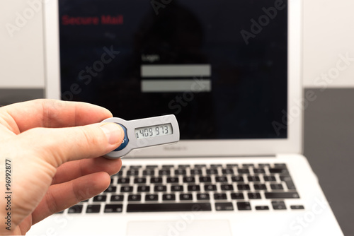 Secure token in front of a laptop
