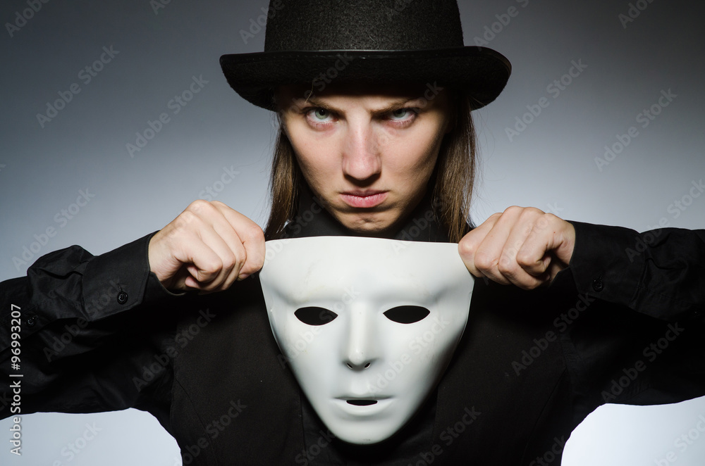 Woman with mask in funny concept Woman with mask in funny concept