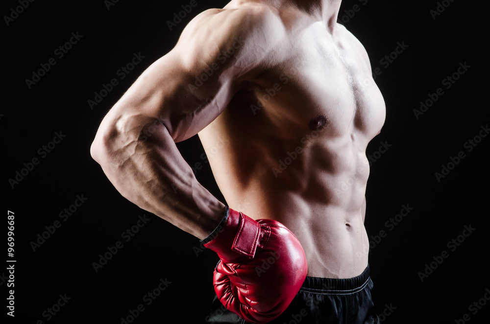 Fototapeta premium Muscular man in boxing concept