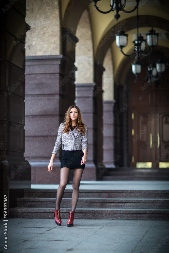 Fototapeta premium very beautiful young woman in the street