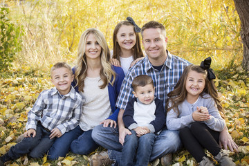 Beautiful Young Family Portrait Outdoors