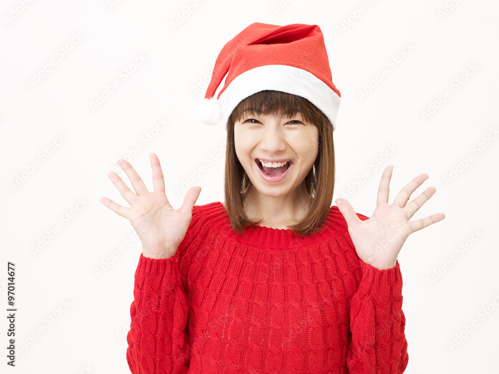 サンタ帽子をかぶる女性 驚く サンタ帽子をかぶる女性 驚く