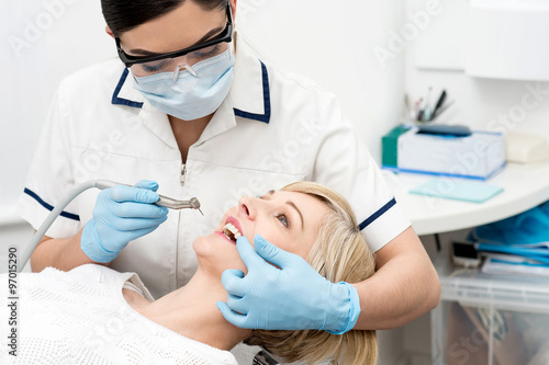 Patient getting treatment from dentist