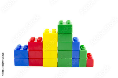 business profit shrinking concept.colorful plastic building blocks isolated white background
