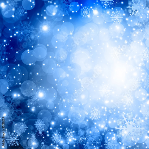 snowflakes and stars shining descending on background