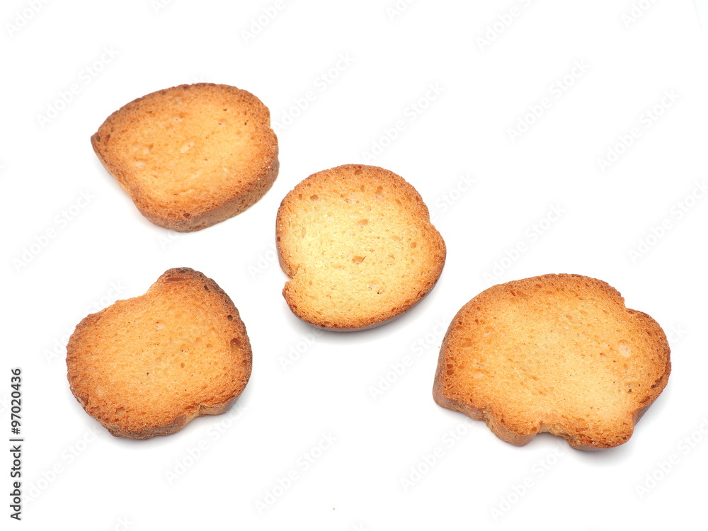 Dried white bread on a white background Dried white bread on a white background