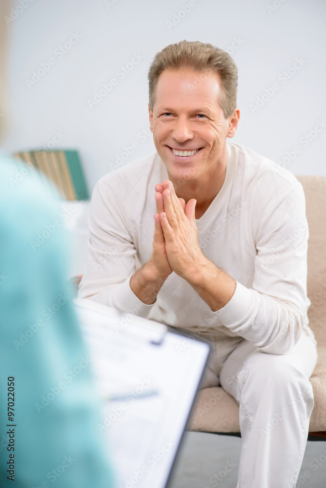 Senior man speaking with psychologist Senior man speaking with psychologist
