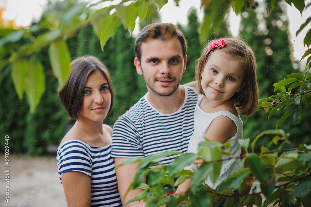 Portrait of happy family in country field Portrait of happy family in country field