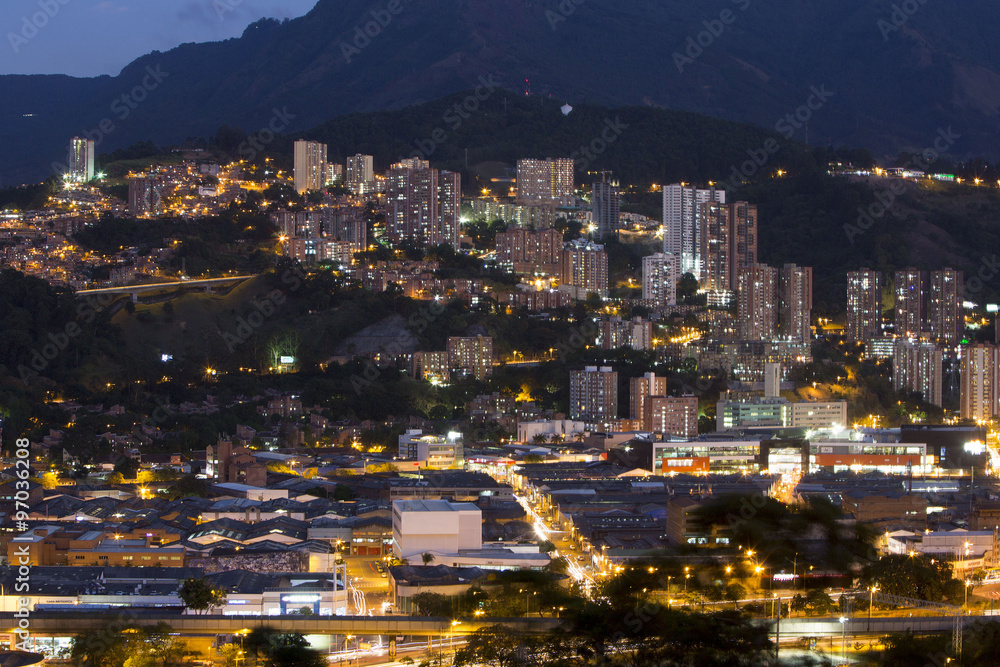 Aerial view of Medellin at night with residential and office buildings. Colombia