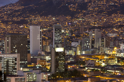 Aerial view of Medellin at night with residential and office buildings. Colombia