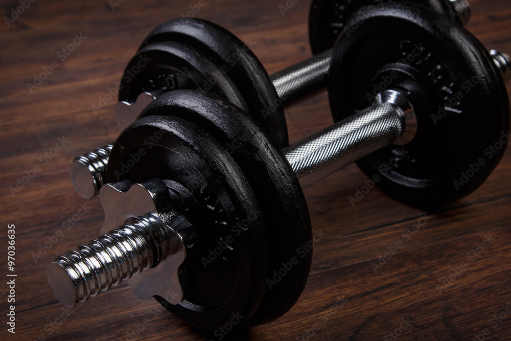 Naklejka premium Dumbbells on the floor