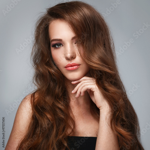 Beautiful woman with long glossy hair
