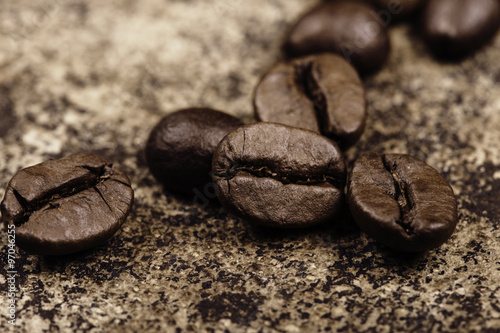 coffee beans on grunge surface closeup