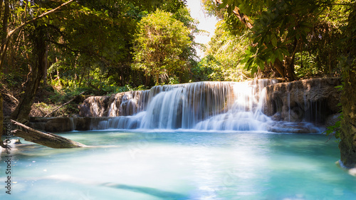 Beautiful deep forest blue stream waterfalls in national park of Thailand © pranodhm