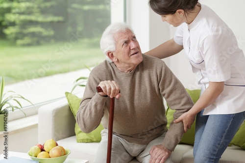 Photos Man leaning on walking stick