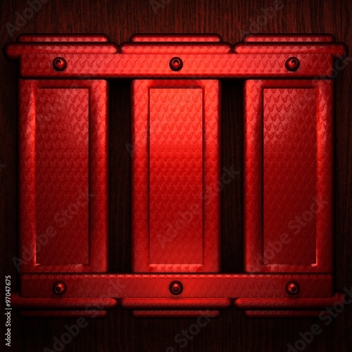 red pollished metal on wooden bachkround photo