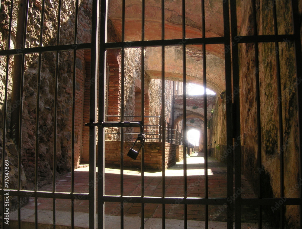 Iron bars with a lock at the fortress Iron bars with a lock at the fortress