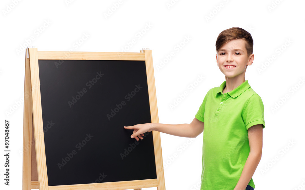 happy boy with chalk and blank school blackboard happy boy with chalk and blank school blackboard