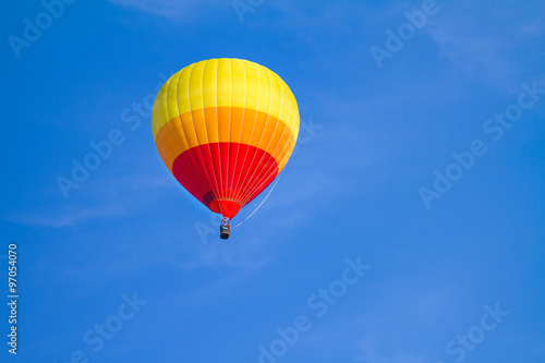 colorful hot air balloon on blue sky © pixy_nook