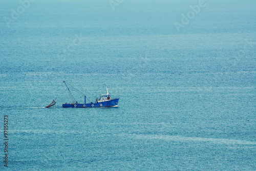 Fishing-boat in the Sea photo