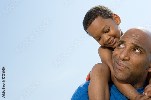 Son on fathers shoulders