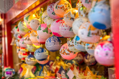traditional christmas market decoration, kiosk full of decorated balls © jan_S