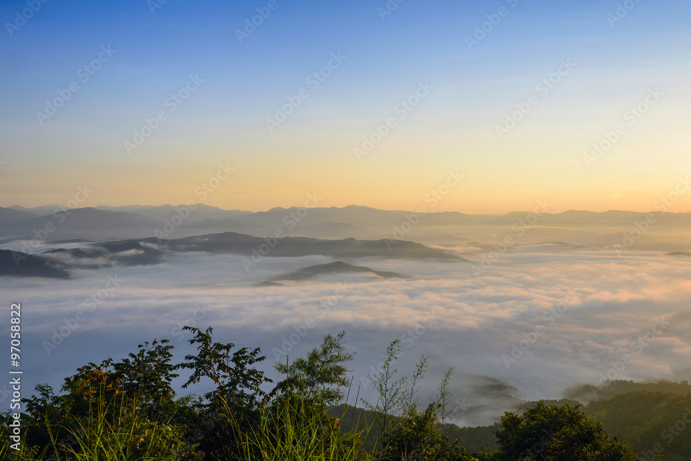 sunrise with the fog at the mountain