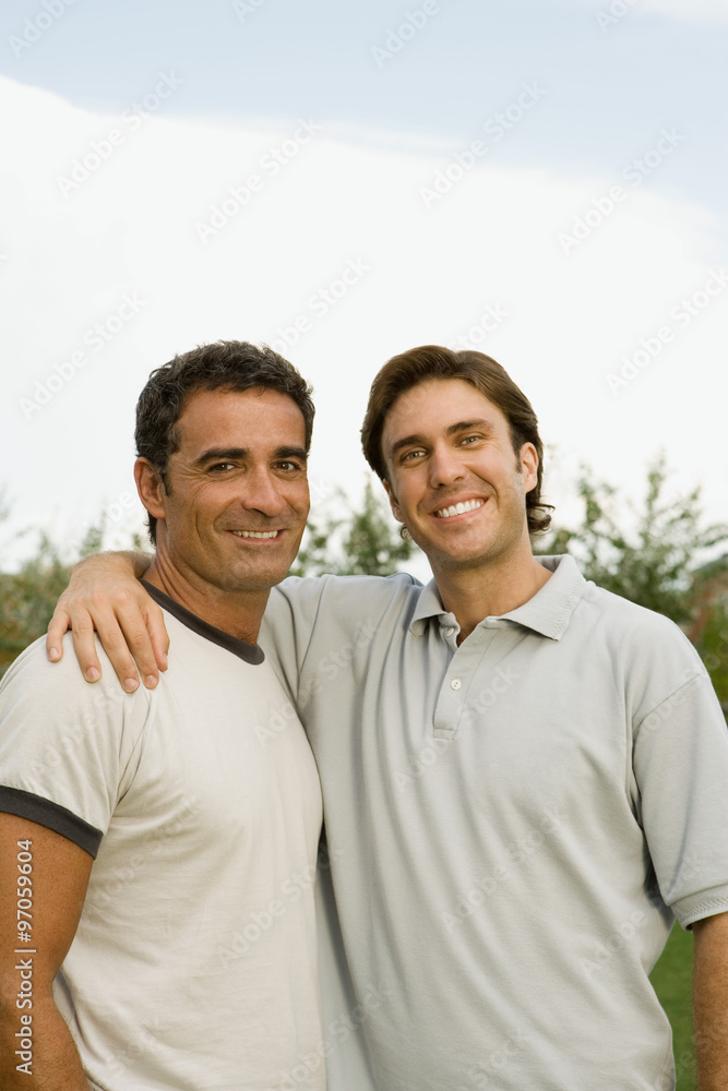 Two smiling men outdoors Two smiling men outdoors