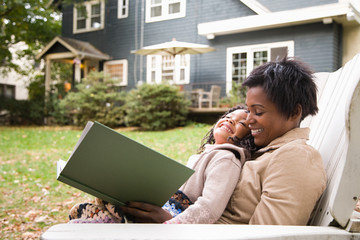 Mother and daughter with book