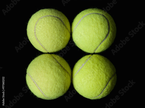 Tennis balls, with its characteristic lines forming a heart