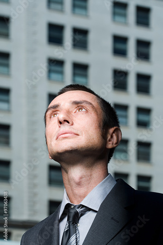 Businessman looking up © xixinxing