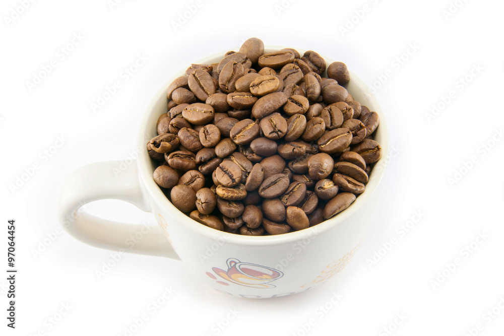 Cup full of coffee beans isolated Cup full of coffee beans isolated