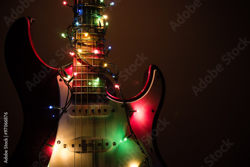 electric guitar wrapped by garland