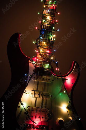 electric guitar wrapped by garland