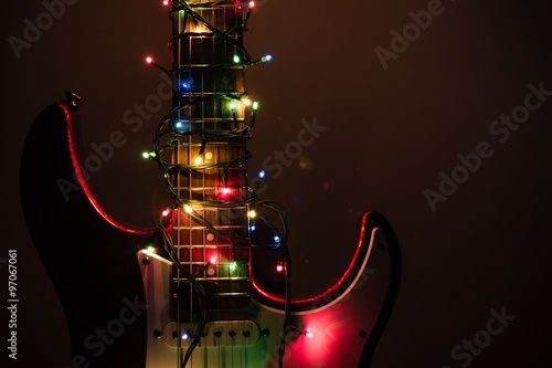 electric guitar wrapped by garland