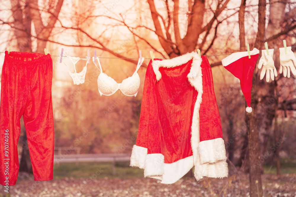 santa claus suit hung out to dry mixed with lingerie santa claus suit hung out to dry mixed with lingerie