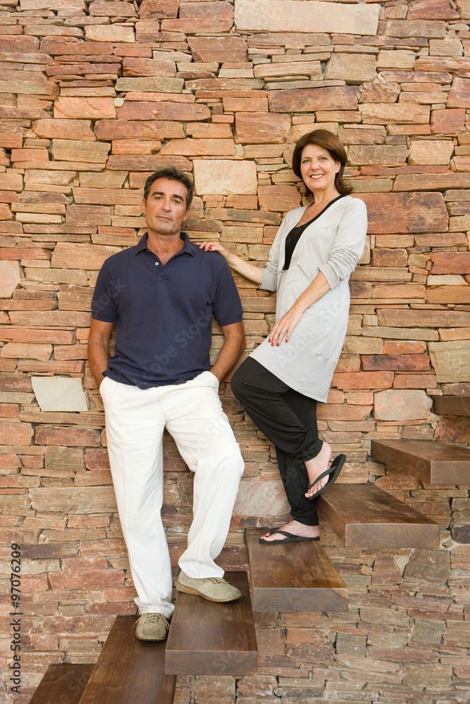 Couple standing on steps Couple standing on steps